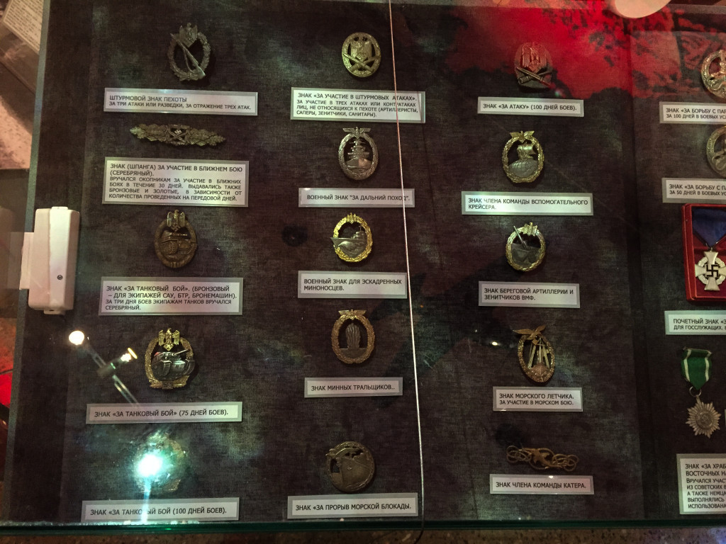 Looted Nazi awards. Notice the security sensor, Hitler's Gold Party Badge was put on display in Moscow in 2005 and was stolen after someone smashed the case with a hammer and ran off with it. 